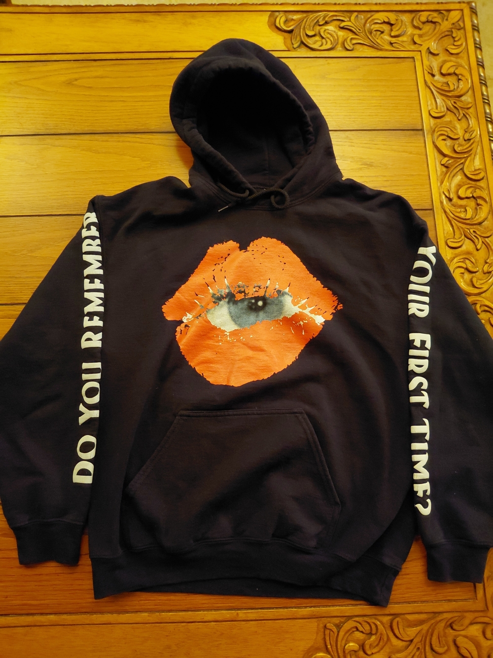 Black Graphic Hoodie with Orange Lip Eye Print